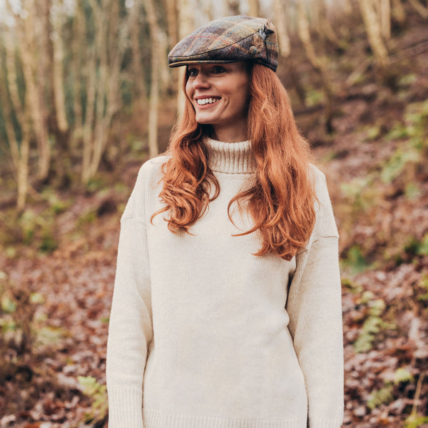 The Hat Shop Failsworth British wool tartan feather flat cap, lifestyle image