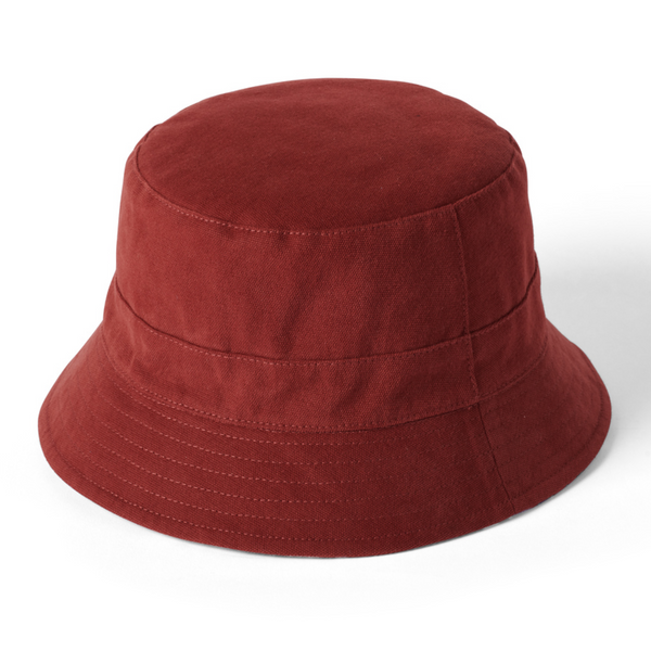 Reversible bucket hats one side solid red and one with floral pattern on a white background