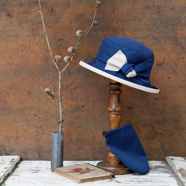 The Hat Shop Proppa Toppa Waterproof Hat in Navy & Ivory With a bag